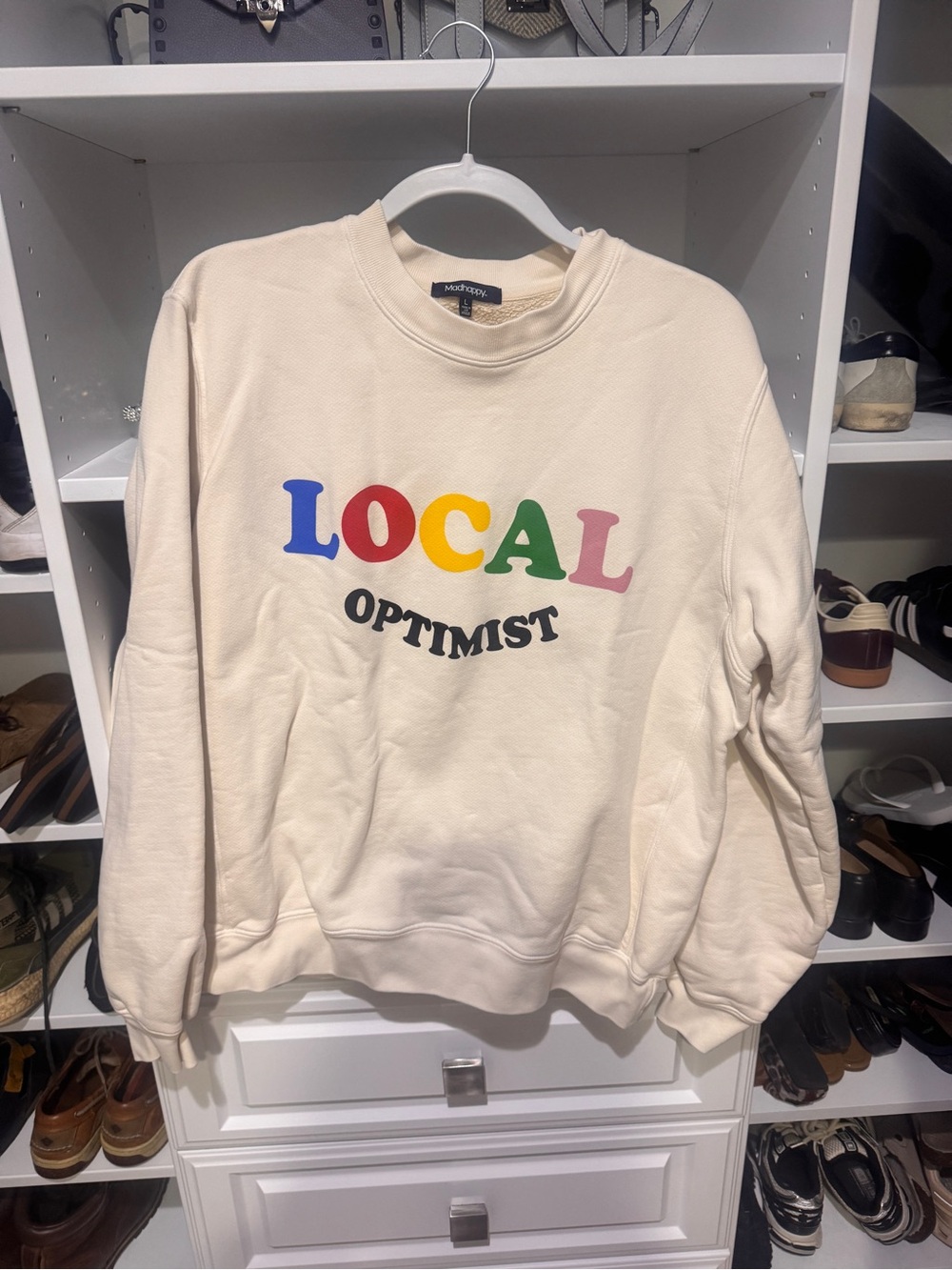 Madhappy Local Optimist Crewneck Sweatshirt in Cream with Rainbow Lettering